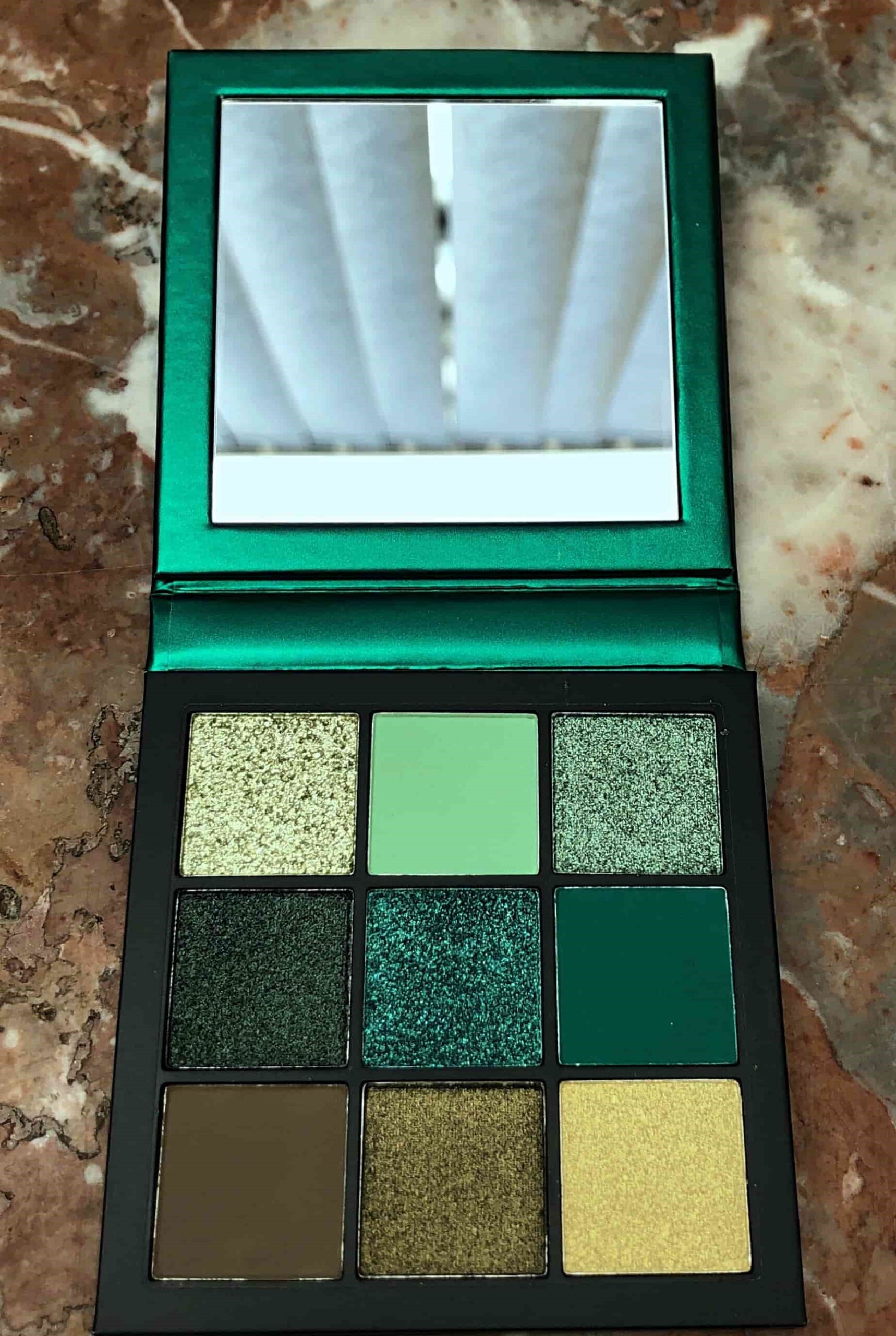 9 Best Goth Eyeshadow Palettes That Redditors Swear By Huda Beauty Emerald Obsessions shadow Palette